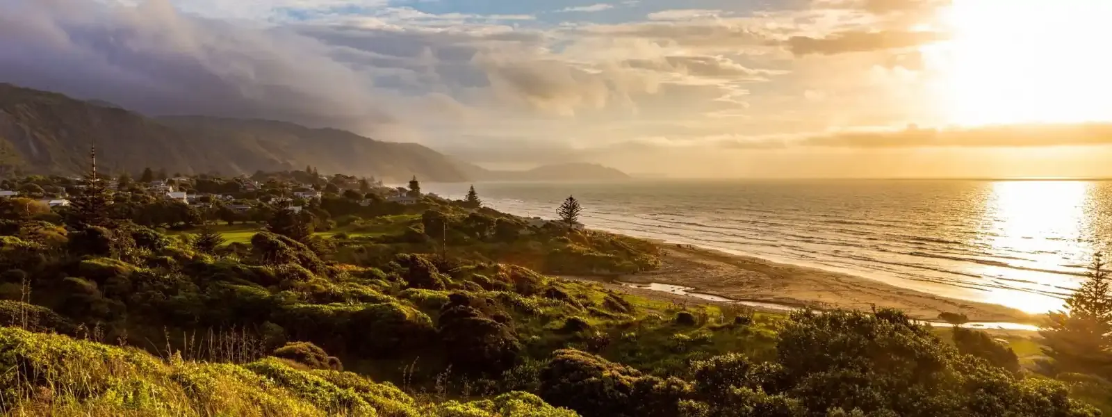 Sunset over the Kāpiti Coast with Kāpiti Island on the horizon