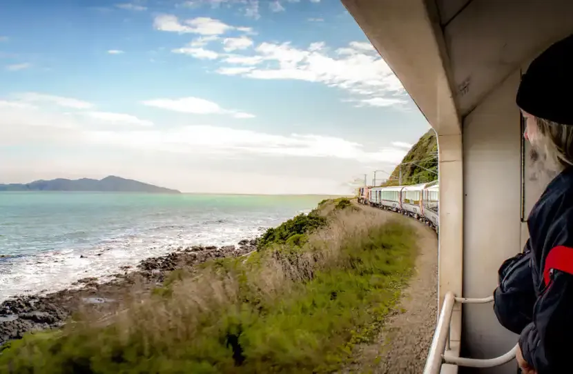 View of Kāpiti Island from the Northern Explorer’s open-air viewing carriage