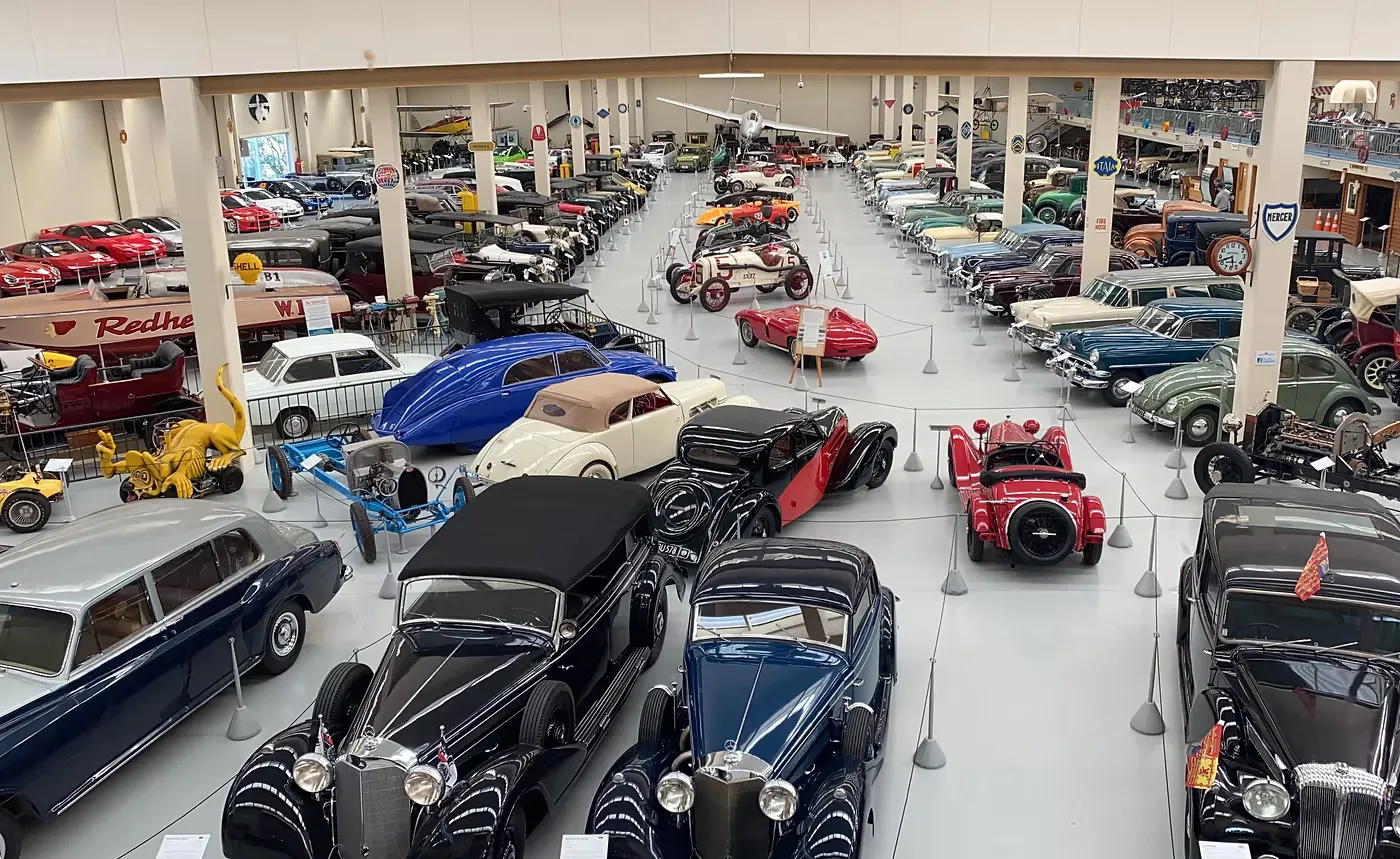 Rows of classic cars on display inside the Southward Car Museum